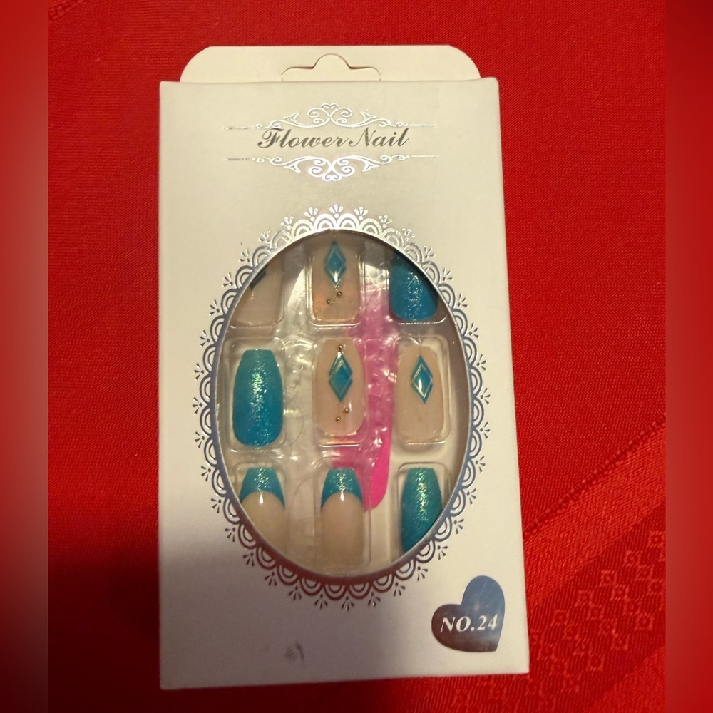 Flower Nail" brand blue and nude press-on nails featuring a geometric design